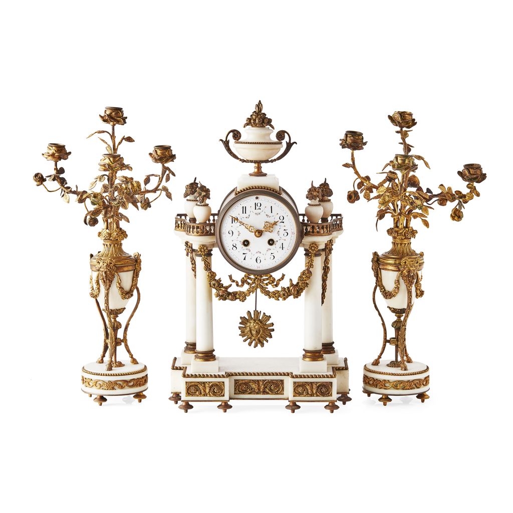 Appraisal: FRENCH WHITE MARBLE AND GILT METAL CLOCK GARNITURE LATE TH