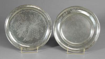 Appraisal: Two engraved pewter plates one elaborately engraved bird on leafy