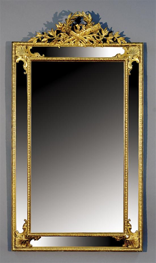 Appraisal: Continental carved giltwood cushion mirror mid th centuryrectangular frame surmounted