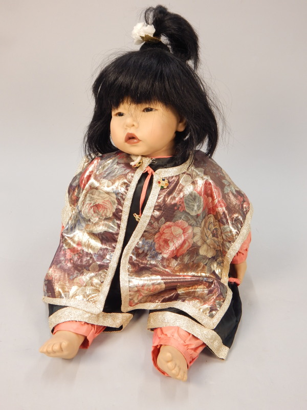 Appraisal: A Gotz oriental style porcelain doll modelled by Carlos cm