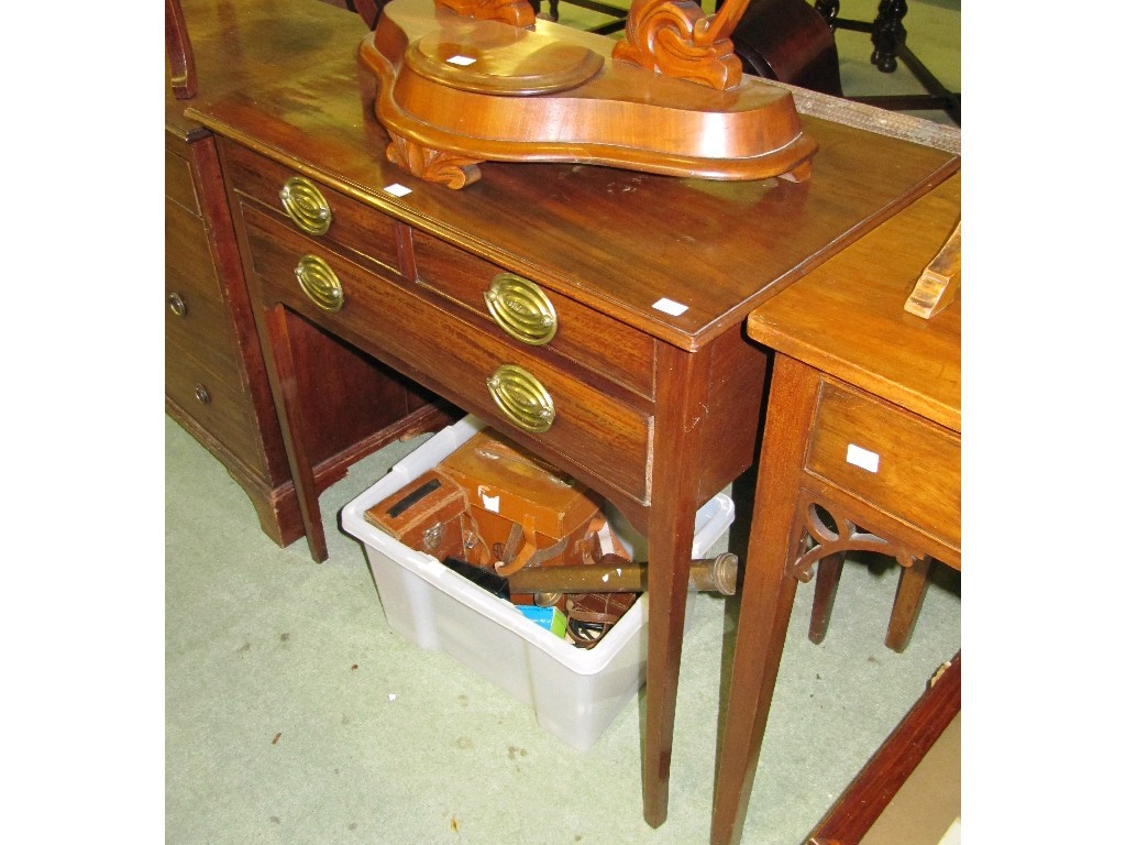 Appraisal: Mahogany three drawer side table