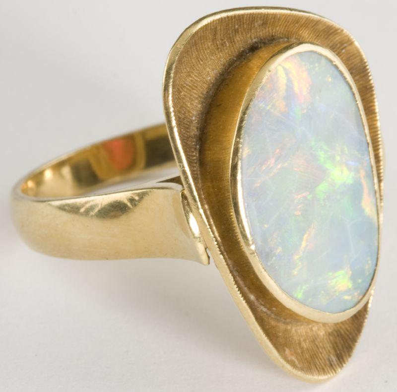 Appraisal: KT Custom Modernist Opal Ring likely Italian bezel set with