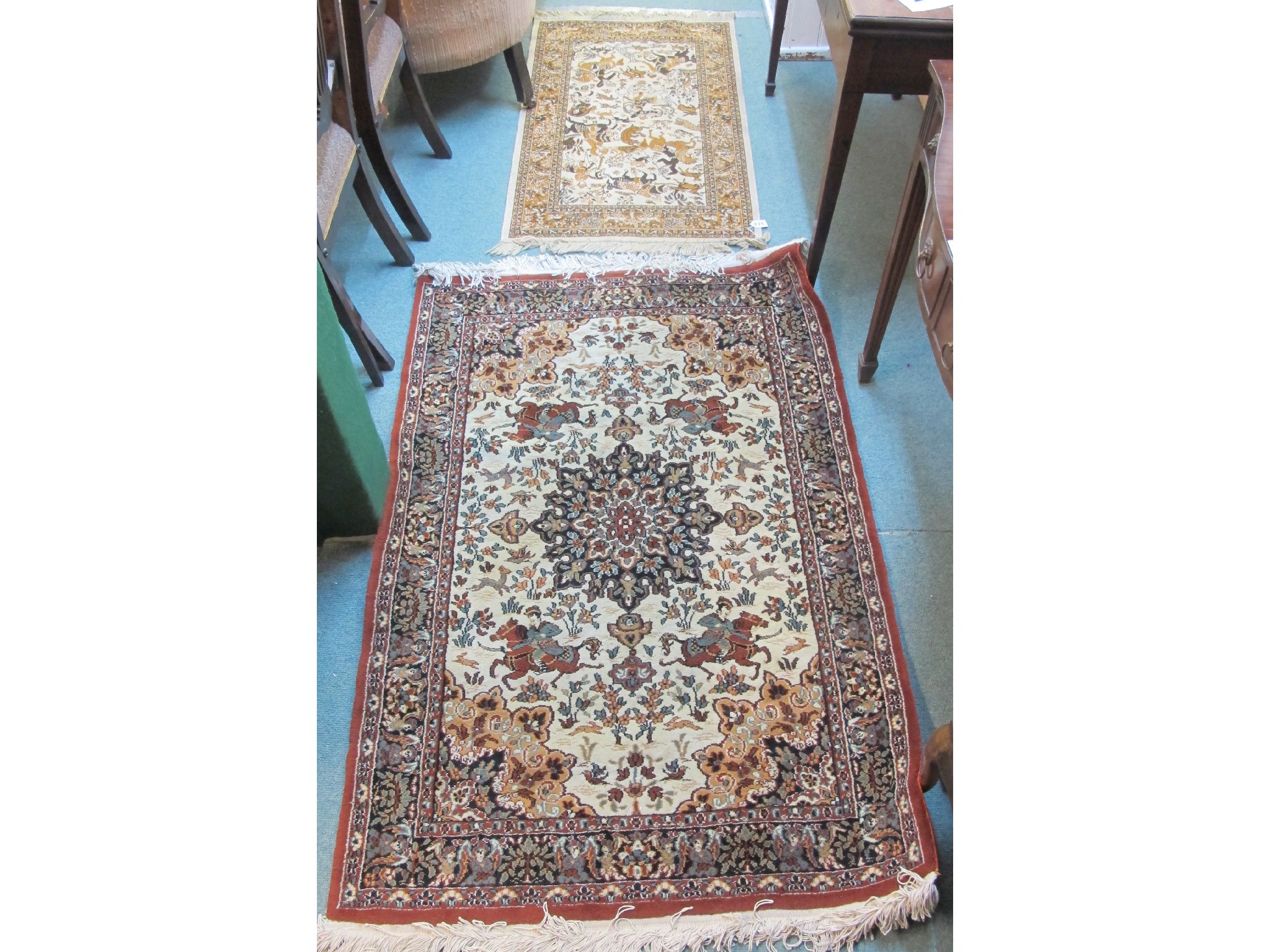 Appraisal: A cream ground wool rug x cm and a small