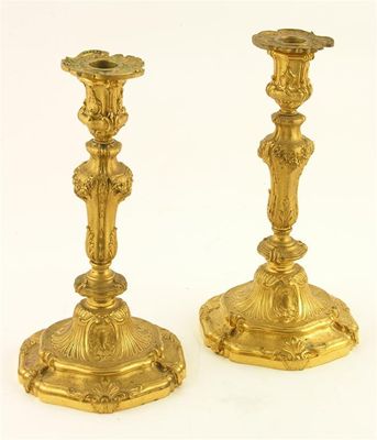 Appraisal: A pair of Louis XV style ormolu candlesticks by Henri