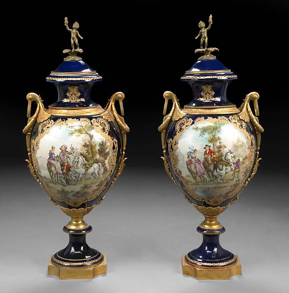 Appraisal: A large pair of Sevres style porcelain gilt bronze mounted