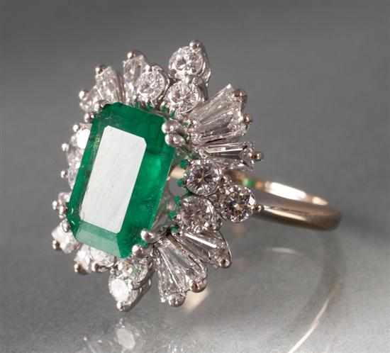 Appraisal: Emerald and diamond ring centering an approximately cts emerald mounted