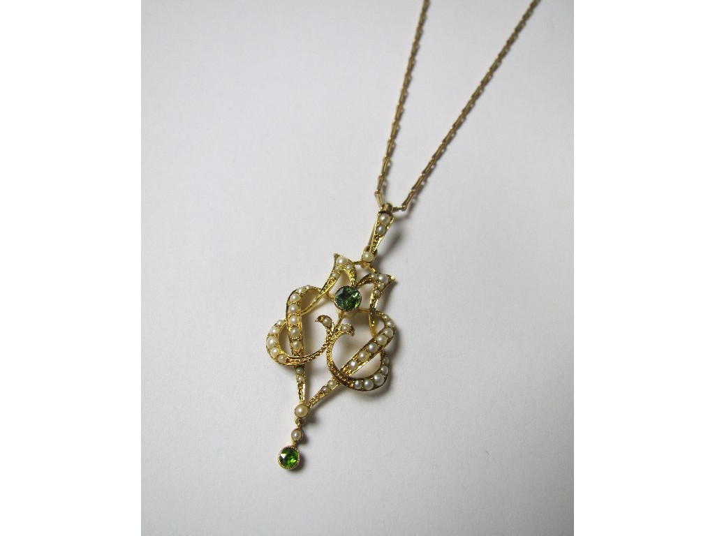 Appraisal: Edwardian ct gold peridot and seed pearl set pendant on