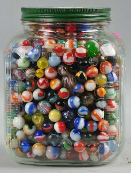 Appraisal: Jar of Approximately Marbles Description Jar contains vintage marbles including