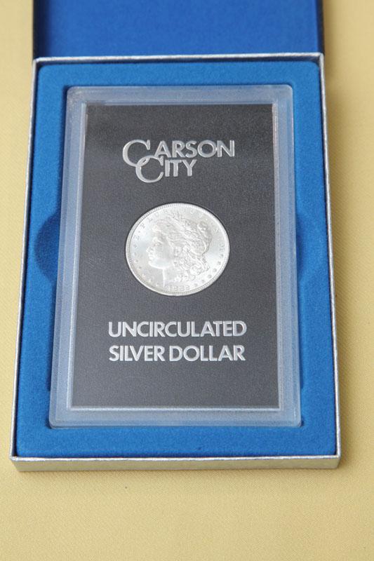 Appraisal: CARSON CITY SILVER DOLLAR In a lucite case and dated