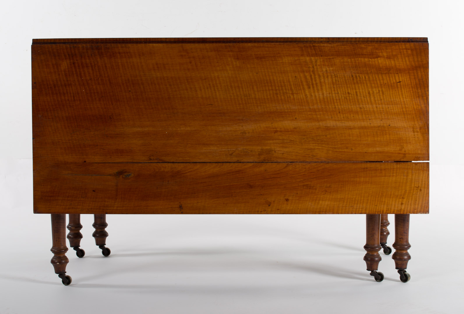 Appraisal: Federal tiger maple drop leaf gate-leg table circa New England