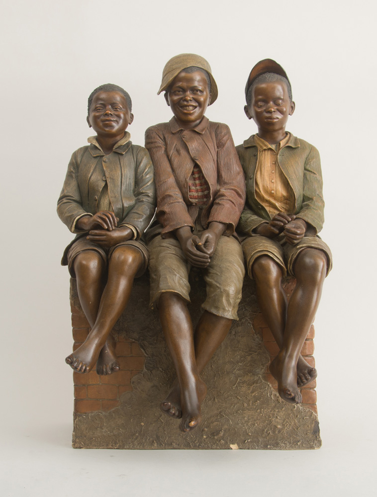 Appraisal: FREDERICK GOLDSCHEIDER - THREE BOYS SEATED ON A LEDGE Polychrome