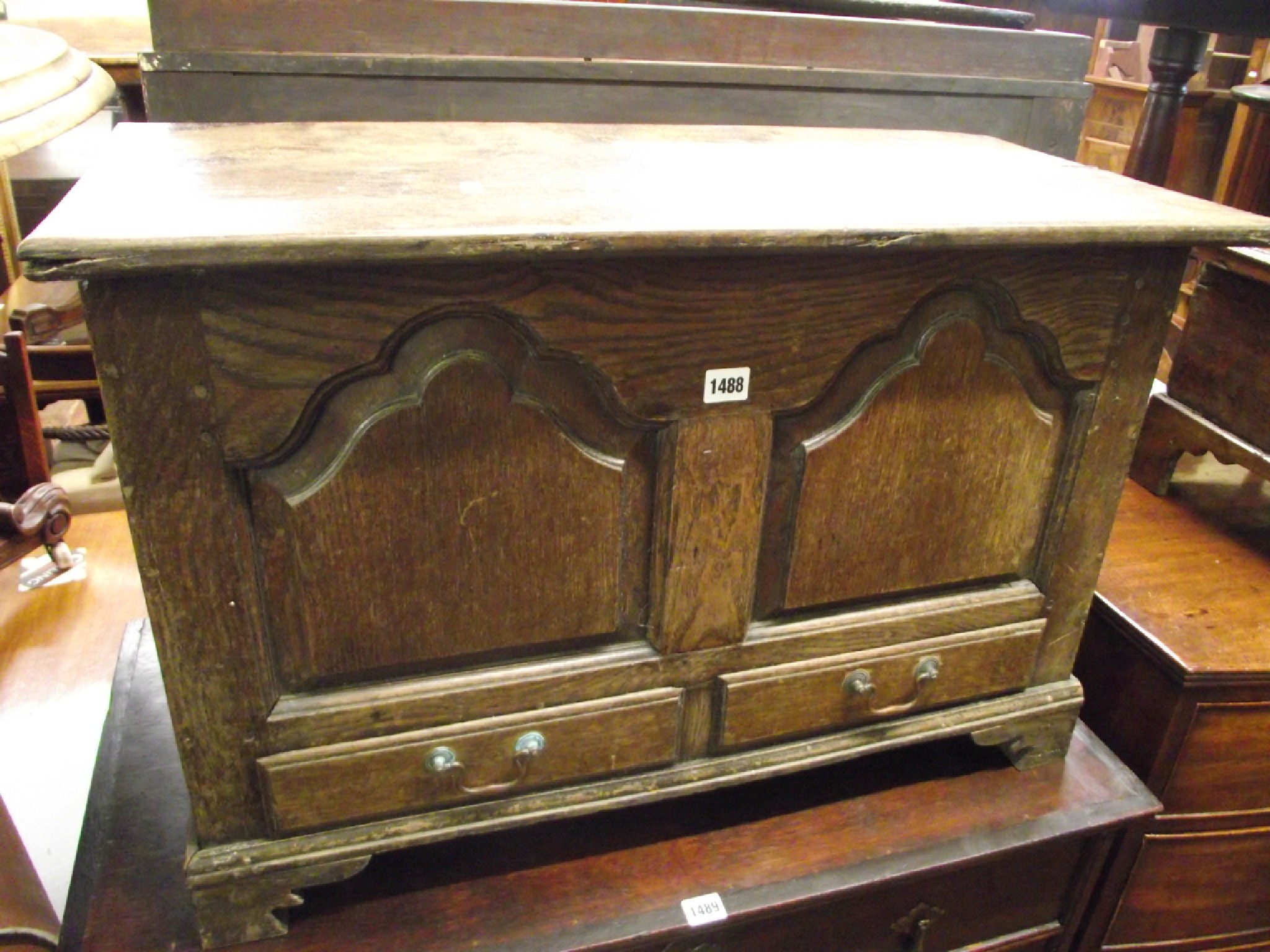 Appraisal: An th century oak coffer bach with rising lid the