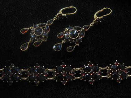 Appraisal: Garnet bracelet and earrings Victorian Traditional bracelet with flower form