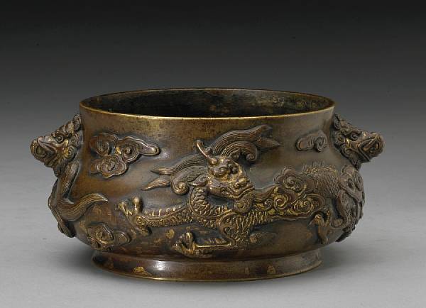 Appraisal: A cast bronze censer Xuande Mark th Century Its swelling