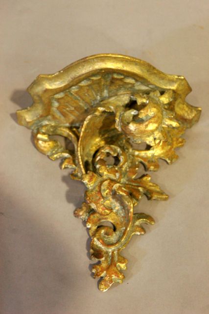 Appraisal: A carved gilt wall sconce cm