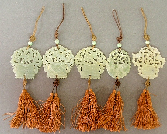 Appraisal: - Five carved jade medallions with tassels probably early th