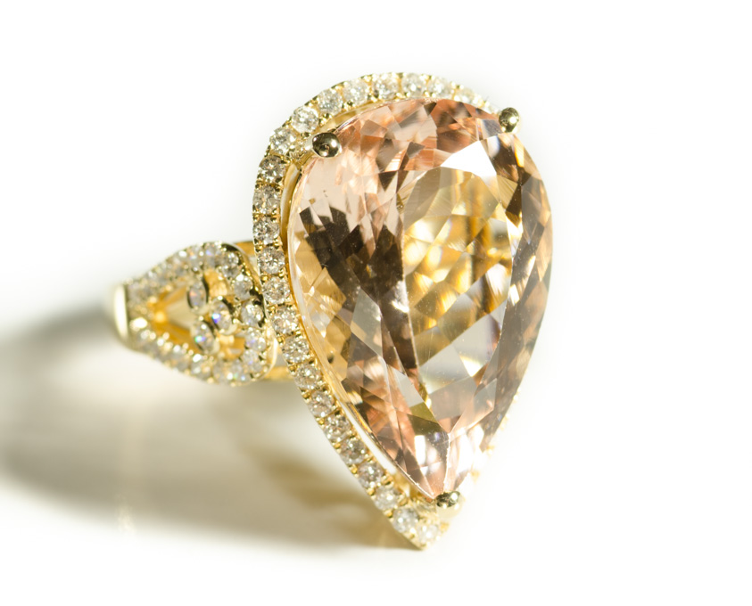 Appraisal: MORGANITE DIAMOND AND FOURTEEN KARAT GOLD RING with round-cut diamonds