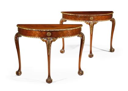 Appraisal: Pair of George II style parcel-gilt mahogany console tables Each