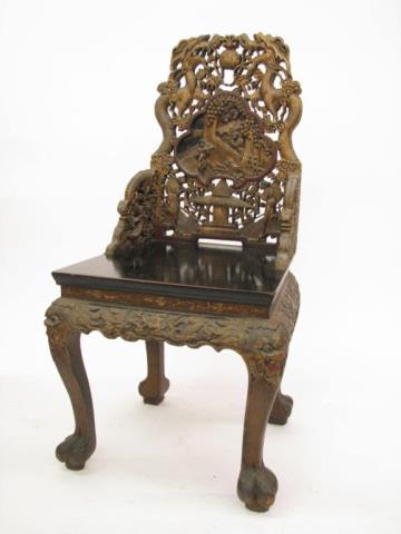 Appraisal: Ornately carved and decorated Oriental chair depicting dragons and figures