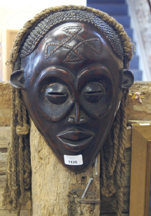 Appraisal: A Congolese 'Ba Chokwe' carved wood tribal mask with rope