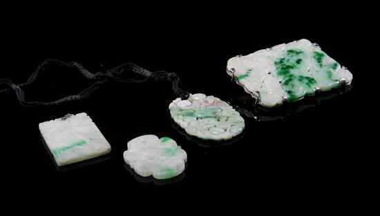 Appraisal: A Group of Four Jadeite Plaques of various forms including