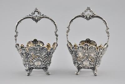 Appraisal: A Pair of German Silver Repousse Baskets with Gold Wash