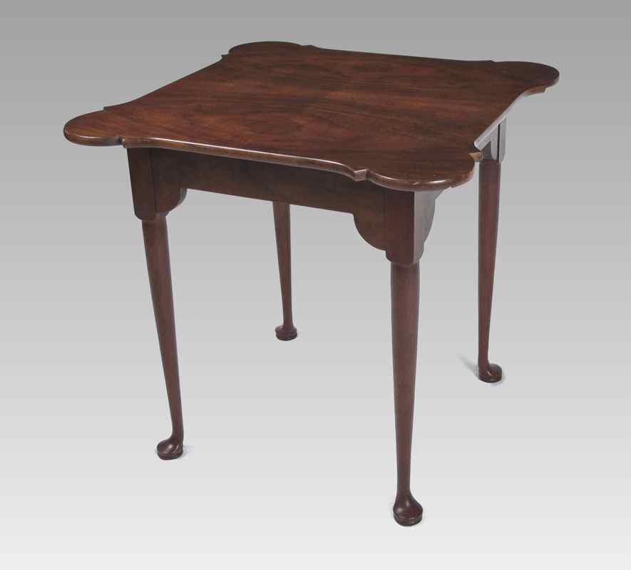 Appraisal: BAKER FURNITURE QUEEN ANNE STYLE TEA TABLE With cookie corners