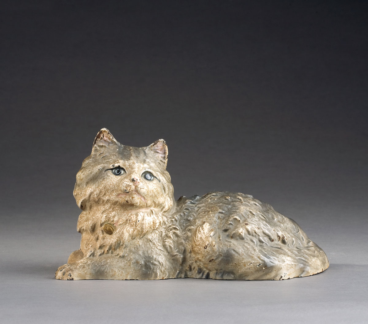 Appraisal: CAST-IRON RECLINING CAT DOORSTOP STAMPED HUBLEY Length inches