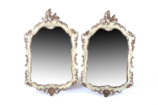 Appraisal: PAIR LOUIS XV STYLE PAINTED AND PARCEL-GILT SERPENTINE WALL MIRRORS