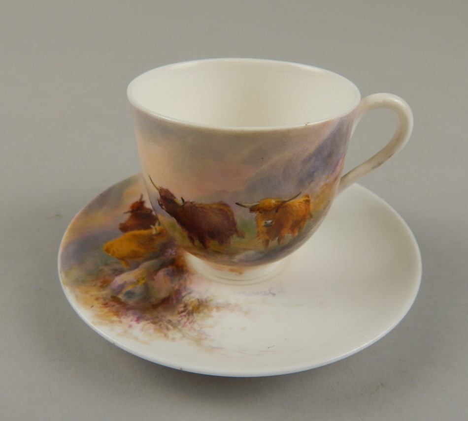 Appraisal: A Royal Worcester style cup and saucer each piece hand