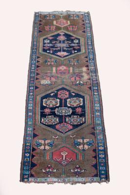 Appraisal: A mid th Century Sarab runner West Persia lacking end