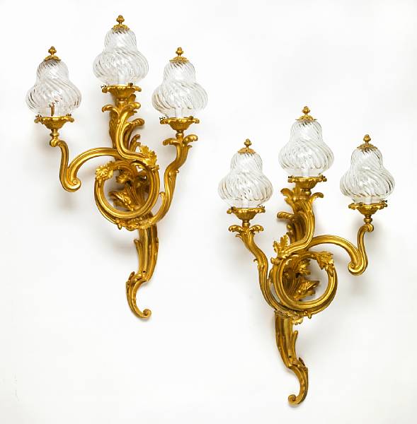 Appraisal: A pair of Louis XV style gilt bronze three light