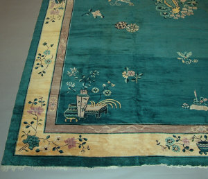 Appraisal: A Chinese carpet the blue field with a central ho-ho