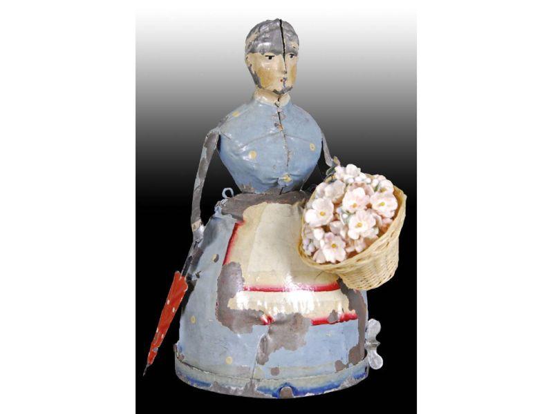 Appraisal: German Hand-Painted Tin Wind-Up Lady Carrying Umbr Description '' T