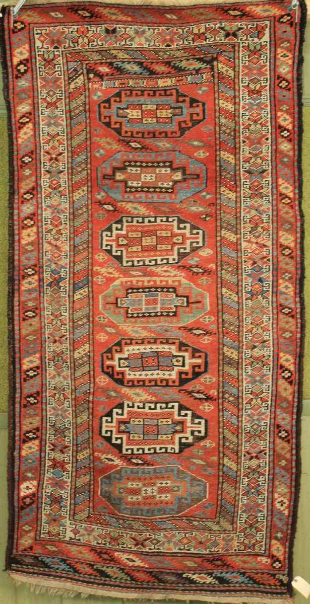 Appraisal: ORIENTAL RUG CAUCASIAN RUNNER ' x ' '' Seven geometrical