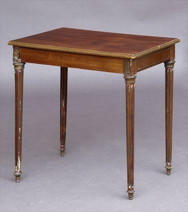 Appraisal: LOUIS XVI-STYLE BRASS-MOUNTED MAHOGANY OCCASIONAL TABLE The top with applied