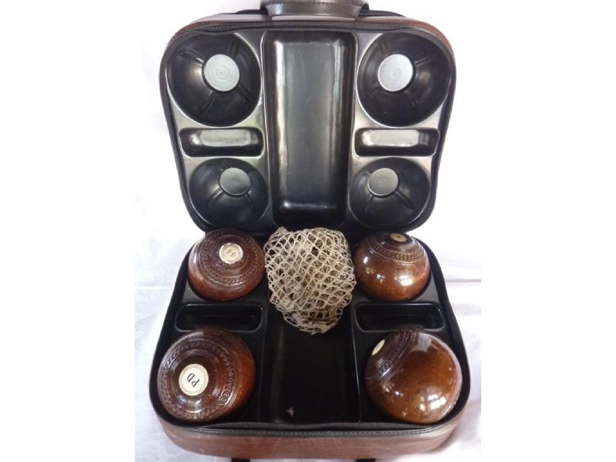 Appraisal: A set of four contemporary bowling balls and case