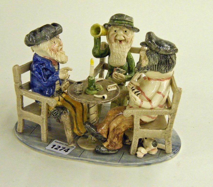 Appraisal: Alan Young pottery figure group of three fishermen sat at