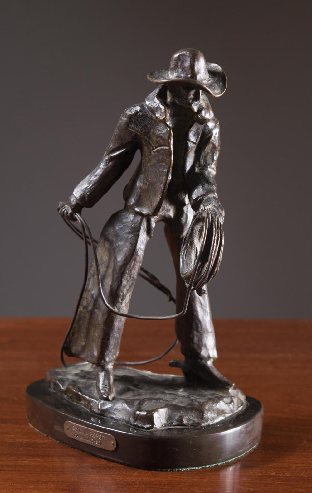 Appraisal: HARRY JACKSON Wyoming Illinois - bronze sculpture Ground Roper cowboy