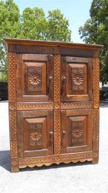 Appraisal: Antique German four door storage cabinet Carved wood front doors