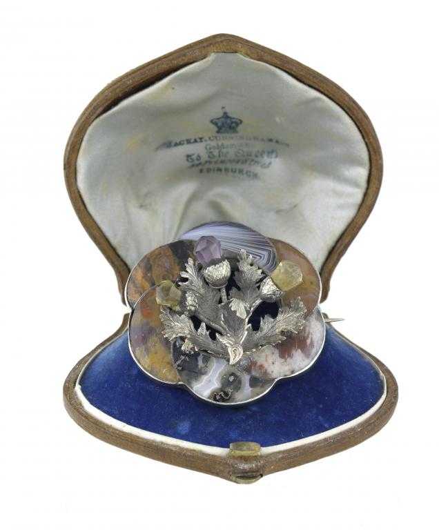 Appraisal: A VICTORIAN SCOTTISH HARDSTONE AND SILVER BROOCH in the form