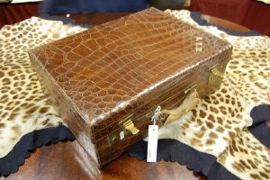 Appraisal: A Mappin Webb crocodile skin suitcase with brass fittings cm