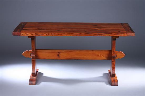 Appraisal: STAINED PINE TRESTLE-BASE TAVERN TABLE th century Plank top with