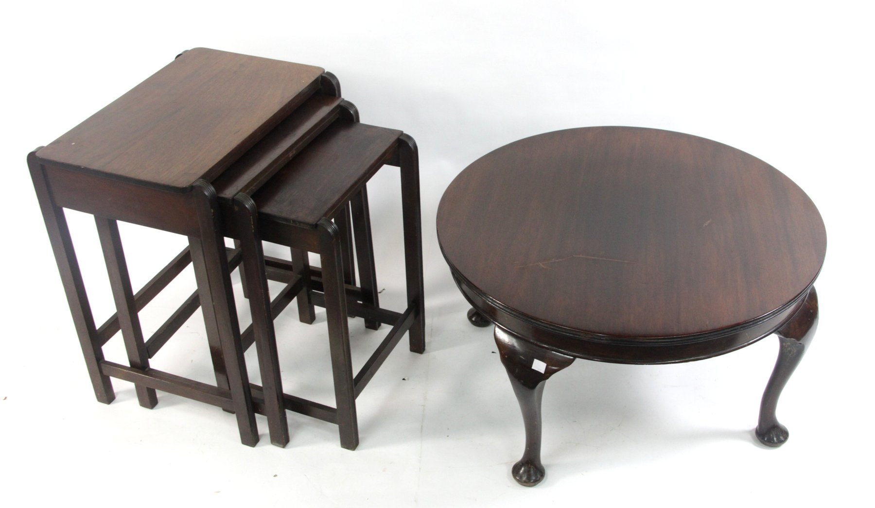 Appraisal: A nest of three Art Deco Style mahogany tables with