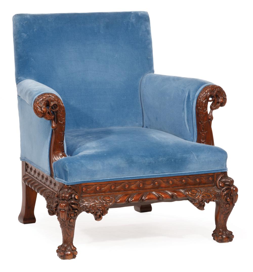 Appraisal: Georgian-Style Mahogany Library Chair elaborately carved eagle heads gadrooning and