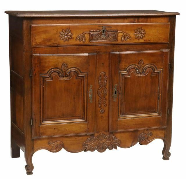 Appraisal: French Provincial Louis XV style sideboard th c shaped top