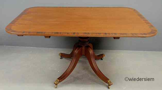 Appraisal: Regency mahogany breakfast table th c the a cross-banded bordered