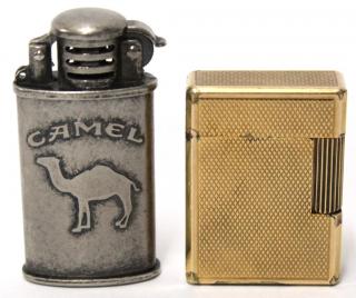 Appraisal: Vintage Dupont Camel Cigarette Lighters Two vintage cigarette lighters one