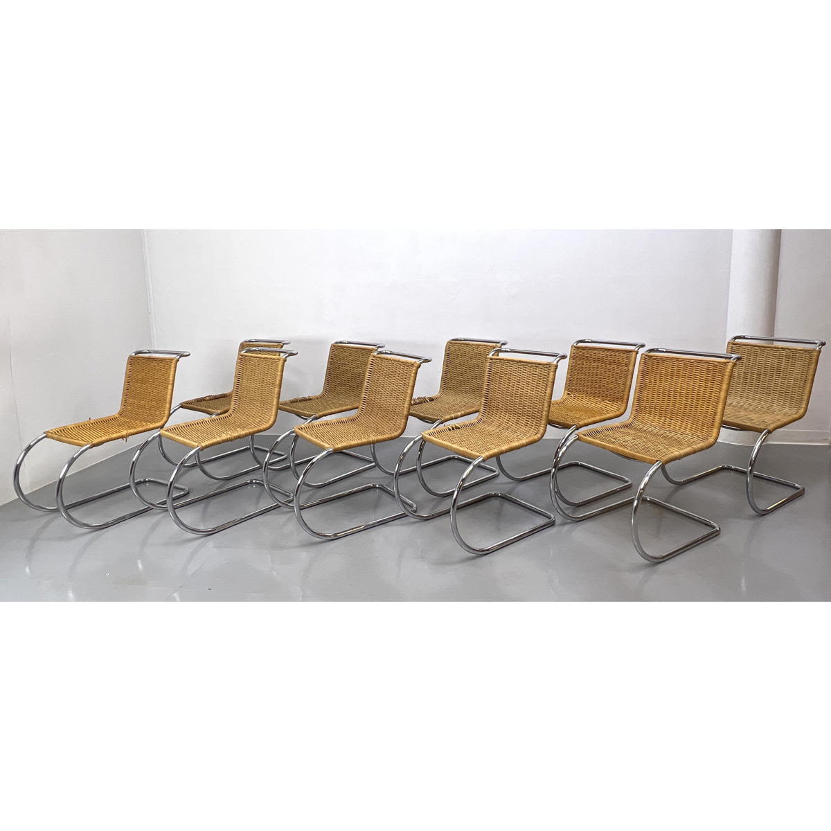 Appraisal: Set STENDIG Chrome and Rattan Dining Chair Mies van der