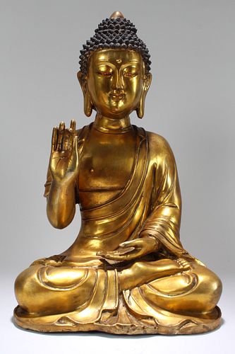 Appraisal: CHINESE MASSIVE GILT RELIGIOUS STATE BUDDHA STATUEChinese Massive Gilt Religious